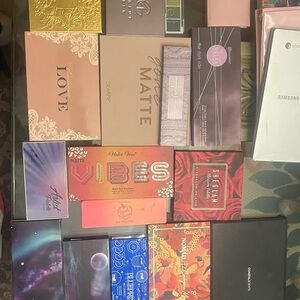 Lots of designer eyeshadows barley used!